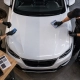 Editorial illustration: DIY or Professional Ceramic Coating: How to Decide