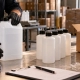 Editorial illustration: Bulk or Filled Bottles for a Private Label Coating Brand?